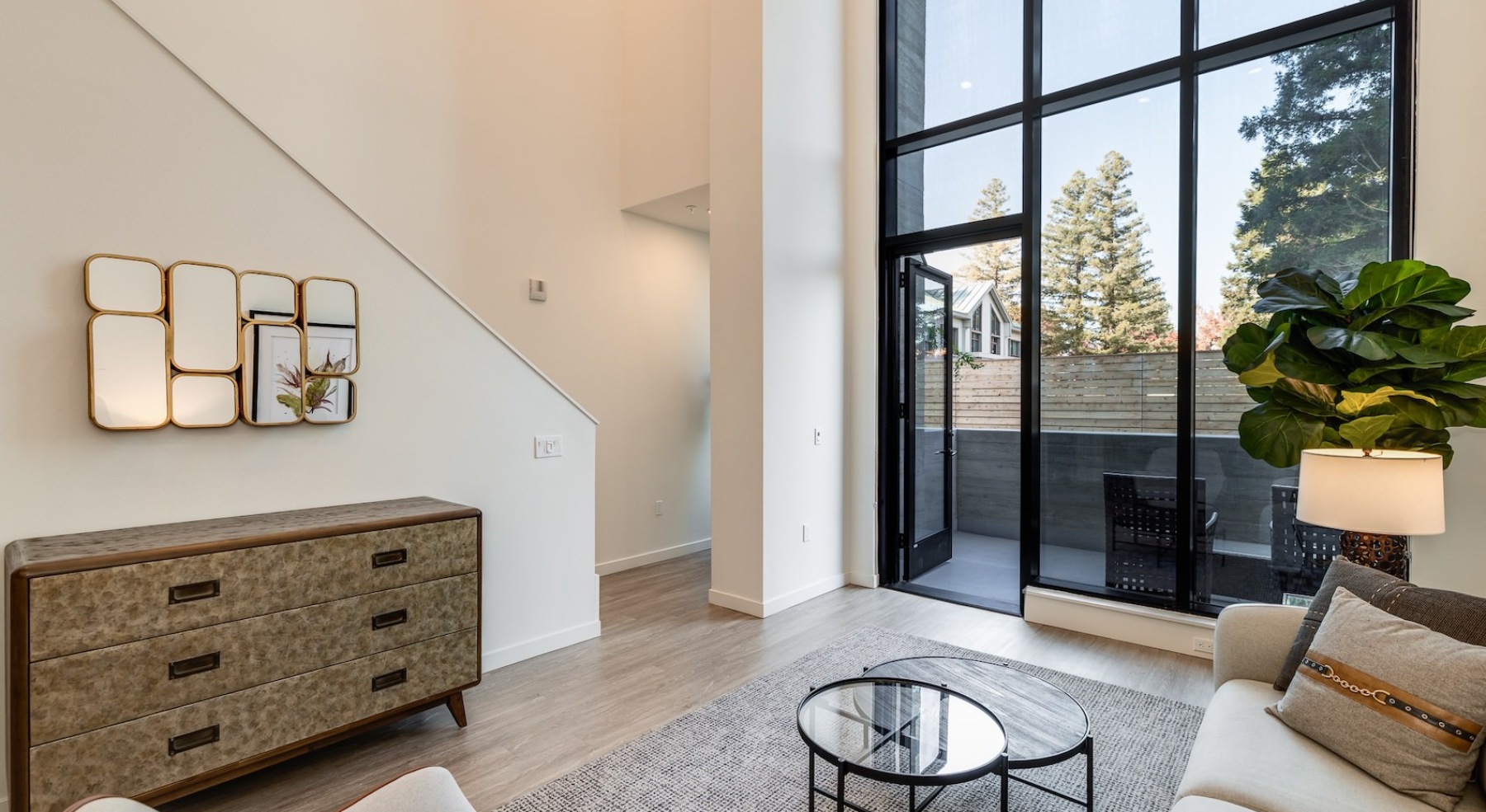 Open space living area with natural lighting